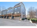 Townhomes with attached garages and private decks at 1304 Queen Lyon Ct, Charlotte, NC 28205