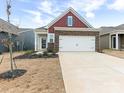 Two-story home exterior with brick and siding, attached garage, and landscaping at 1417 Turkey Roost Rd # 69, Fort Mill, SC 29715