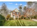 Beautiful two-story home with manicured lawn at 3504 Mountain Cove Dr, Charlotte, NC 28216