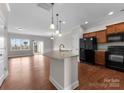 Modern kitchen with granite countertops and stainless steel appliances at 3698 Aldeburgh Sw Rd, Concord, NC 28027