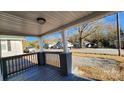 Covered porch offers a view of the street and neighborhood at 832 Richard Ave, Kannapolis, NC 28081