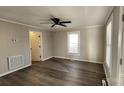 Bright living room with hardwood floors and ceiling fan at 832 Richard Ave, Kannapolis, NC 28081