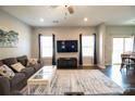 Spacious living room with large TV and comfortable seating at 138 Lanyard Dr # B, Mooresville, NC 28117