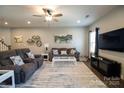 Living Room with comfy sectional and large TV at 138 Lanyard Dr # B, Mooresville, NC 28117