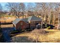 Brick house with attached garage; large backyard and golf course view at 3467 Rock Bridge Dr, Conover, NC 28613