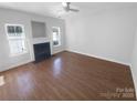 Spacious living room featuring hardwood floors and fireplace at 415 Delta Dr, Fort Mill, SC 29715