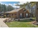 Brick home showcasing side elevation with landscaping at 416 Zelkova St, York, SC 29745