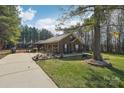 Brick house with attached garage and large yard at 416 Zelkova St, York, SC 29745