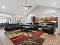 Spacious living room featuring high ceilings, hardwood floors, and an open layout that connects to the kitchen at 416 Zelkova St, York, SC 29745