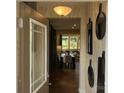 Open entryway with view into the dining area and living room beyond at 5626 De Vere Dr, Indian Land, SC 29707
