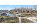 Aerial view of lakefront property with multiple boat slips at 8260 Blades Trl, Denver, NC 28037