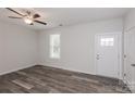 Bright living room featuring hardwood floors and neutral walls at 13331 Central Ave, Huntersville, NC 28078