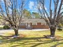 Ranch house with mature trees and a large yard at 3607 Hickory Hwy, Statesville, NC 28677