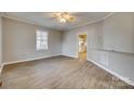 Bright living room with hardwood floors and a view of the kitchen at 105 Linden St, Clover, SC 29710