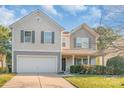 Charming two-story home with a well-manicured lawn and inviting curb appeal at 1219 Century Dr, Clover, SC 29710