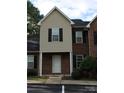 Brick and tan two-story townhome with landscaping at 2240 15Th Ne Ave # 105, Hickory, NC 28601