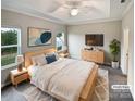 Virtually staged main bedroom with light wood furniture and a modern feel at 22433 Gateway Dr, Lancaster, SC 29720