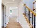 Bright entryway with hardwood floors and staircase at 242 Winford Rd, Troutman, NC 28116