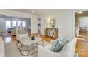 Spacious living room featuring hardwood floors and comfortable seating at 3821 Silver Bell Dr, Charlotte, NC 28211