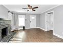 Bright living room with hardwood floors and neutral walls at 835 Belmont Ave, Charlotte, NC 28205