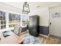 Spacious home office with built-in shelving and window seat at 1147 Bloom Wood Ln, Matthews, NC 28105