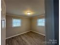 Spacious bedroom with neutral walls and laminate flooring at 1219 Stevens Cir, Gastonia, NC 28054