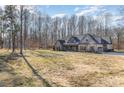 House on a large lot with mature trees and open space at 200 Barra Dr, Waxhaw, NC 28173