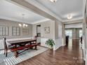 Dining room with hardwood floors and a rustic wooden table at 2056 Angel Oak Dr, Fort Mill, SC 29715