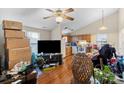 Open living room and kitchen area with wood flooring at 225 American Dr, Salisbury, NC 28147