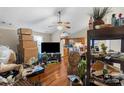 Open living room and kitchen area with wood flooring at 225 American Dr, Salisbury, NC 28147