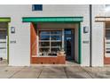 Modern building exterior with unique entryway and green accents at 3572 Artists Way, Charlotte, NC 28205