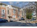 Street view of a three-story brick apartment building at 3649 Warp St, Charlotte, NC 28205