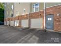 Row of garages with parking area at 3649 Warp St, Charlotte, NC 28205