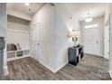 Bright foyer with wood-look flooring and built-in bench at 469 Shallowford Dr, Rock Hill, SC 29732