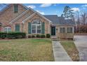 Attractive stone and shingle home exterior with walkway at 4829 Boomerang Way, Charlotte, NC 28269