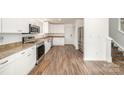 Modern kitchen with stainless steel appliances and granite countertops at 509 Tallwood Ct, Charlotte, NC 28216