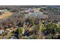 Aerial view of neighborhood with school nearby at 6049 Bluebird Hill Ln, Weddington, NC 28104