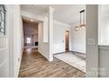 Open entryway leading to living room and dining area at 859 Accent Se Ave, Concord, NC 28025