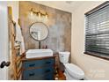 Modern powder room with updated vanity and tile at 11532 Delores Ferguson Ln # 1004, Charlotte, NC 28277