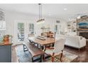 Dining room with live-edge table and bench, access to backyard at 12 Tanglewood Rd, Clover, SC 29710