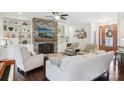 Spacious living room with stone fireplace and built-in shelving at 12 Tanglewood Rd, Clover, SC 29710