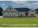 Sample photo of a gray one-story house with a green lawn at 142 Falls Leaf Dr, Troutman, NC 28166