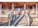 Inviting front entrance with wooden stairs and porch at 148 Shawver Ln, Statesville, NC 28625