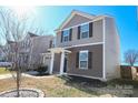 Two-story house with neutral siding and a small front yard at 1812 Hooper Ct, Charlotte, NC 28212