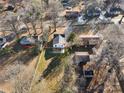 House and surrounding neighborhood from above at 30 Walnut Nw Ave, Concord, NC 28027