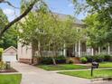 Two-story house with a detached garage and driveway at 3277 Richards Xing, Fort Mill, SC 29708