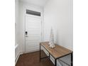 Bright entryway with wood floor and console table at 4027 Capital Ridge Ct # 10, Charlotte, NC 28205