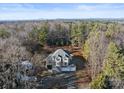 Two-story house with a large yard, surrounded by trees and mountains at 5774 Crown Ter, Hickory, NC 28601