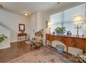 Bright and airy entryway with hardwood floors and stylish console tables at 6706 Blackwood Ln, Waxhaw, NC 28173