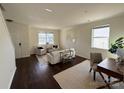 Spacious living area featuring hardwood floors and ample natural light at 6706 Blackwood Ln, Waxhaw, NC 28173